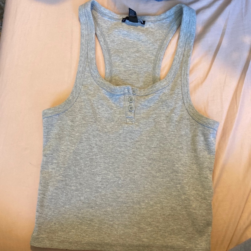 Grey tank top from Forever 21. 3 buttons on the front.